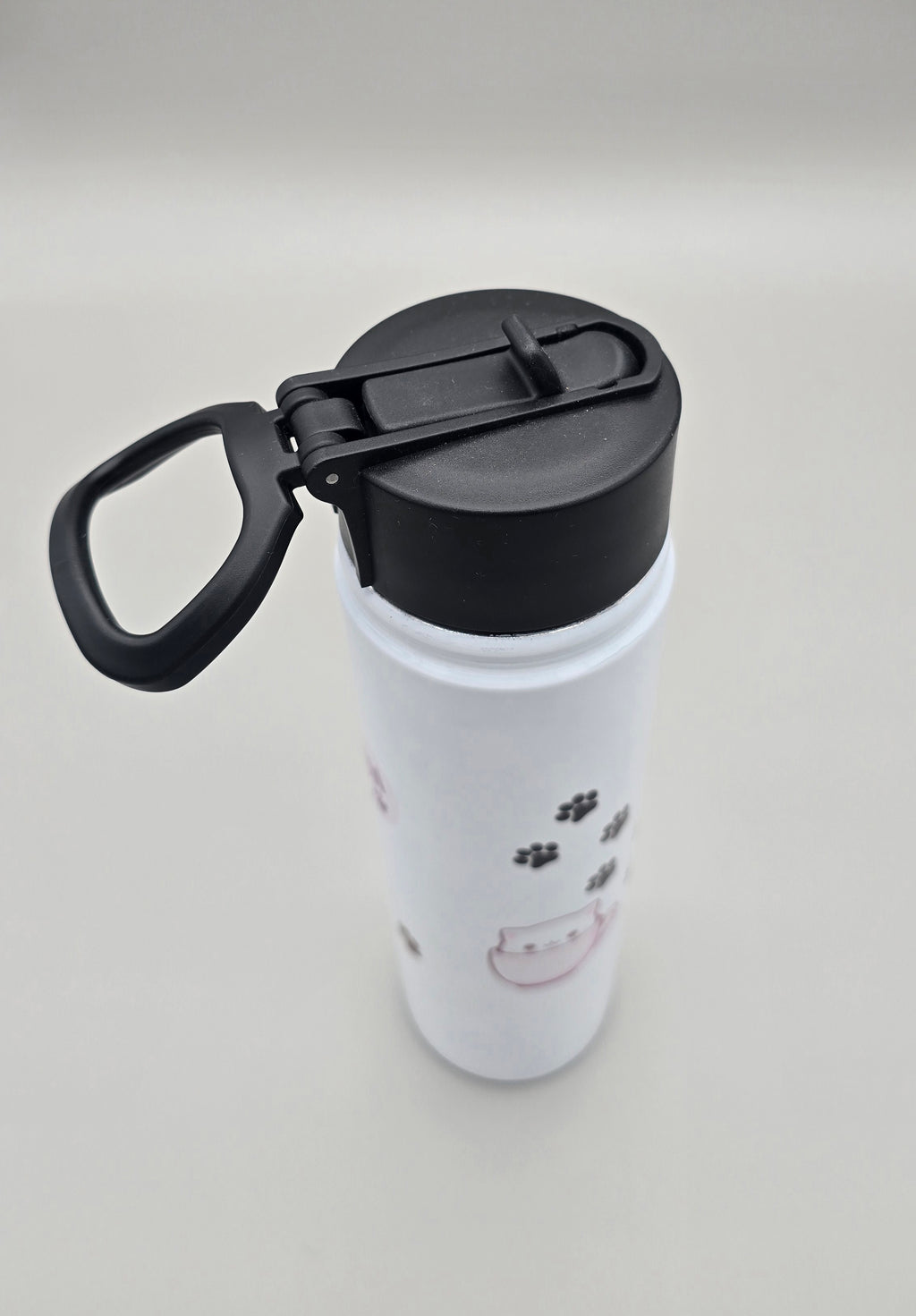 Cat in Pink Cup Paw Prints